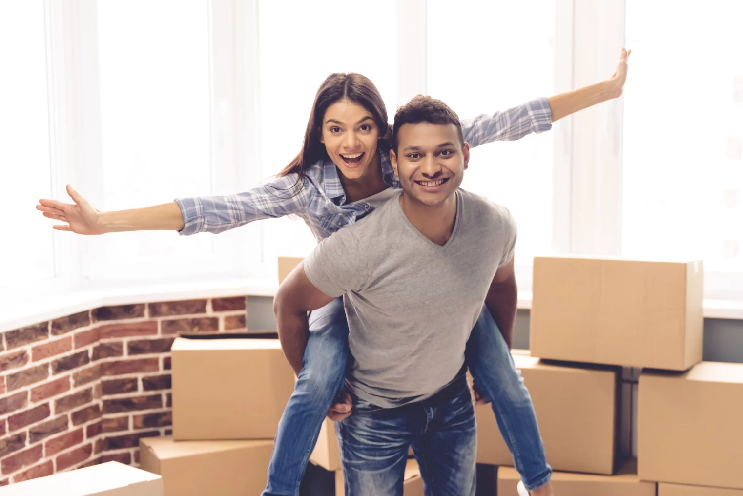 Young couple moving into new home
